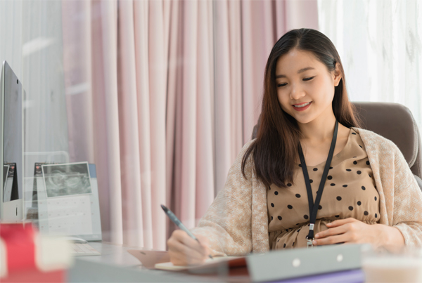 Pregnant working mom before maternity leave in Singapore